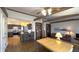 Open floor plan features a kitchen, breakfast bar, and living room space at 622 N Dequincy St, Indianapolis, IN 46201