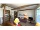 Inviting living room with exposed beams, shelving, and natural light at 622 N Dequincy St, Indianapolis, IN 46201