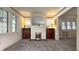 Bright living room featuring fireplace with white brick and symmetrical built-ins at 622 N Dequincy St, Indianapolis, IN 46201
