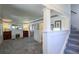 Cozy living room showcasing fireplace, staircase and classic design elements at 622 N Dequincy St, Indianapolis, IN 46201