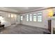 Bright and airy living room with natural light, classic trim, and a charming fireplace at 622 N Dequincy St, Indianapolis, IN 46201
