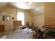 Upstairs bedroom with natural light, showing potential for storage or conversion into a functional living area at 633 N East St, Greenfield, IN 46140