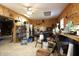 A well-lit garage featuring plywood walls and organized storage solutions at 633 N East St, Greenfield, IN 46140