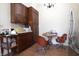 Efficient eat-in kitchen with ample cabinetry and updated appliances at 633 N East St, Greenfield, IN 46140