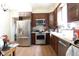 Modern kitchen features stainless steel appliances and updated cabinets at 633 N East St, Greenfield, IN 46140