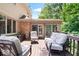 Enjoy the outdoors from the wooden deck featuring a comfortable seating area with lovely views at 7250 Royal Oakland Dr, Indianapolis, IN 46236
