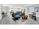 A open concept living space featuring stylish furniture, a cozy design, and a modern aesthetic at 734 Summitcrest Dr, Indianapolis, IN 46241