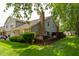 Charming backyard with lush green grass, privacy fence, and attractive exterior at 7612 Farm View E Cir, Indianapolis, IN 46256