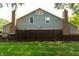 Well-maintained backyard with a privacy fence and neatly manicured lawn at 7612 Farm View E Cir, Indianapolis, IN 46256