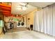 Spacious garage featuring laundry area, storage shelves, and room for parking at 7612 Farm View E Cir, Indianapolis, IN 46256