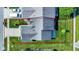 Aerial shot of a meticulously maintained property with a well-kept lawn, landscaping, and a spacious driveway at 785 Cottage Ln, Greenwood, IN 46143