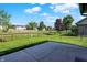 The rear patio offers a great view of the fenced yard and the surrounding neighborhood at 785 Cottage Ln, Greenwood, IN 46143