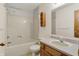 Bathroom featuring a tub, a decorative wood cabinet, and a modern vanity at 785 Cottage Ln, Greenwood, IN 46143