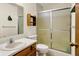 A full bathroom with modern sink and sliding glass door shower at 785 Cottage Ln, Greenwood, IN 46143