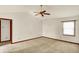 Bright, airy bedroom with neutral walls, carpeting, vaulted ceiling and a ceiling fan at 785 Cottage Ln, Greenwood, IN 46143