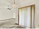 Open-concept living area with a chandelier and slider doors at 785 Cottage Ln, Greenwood, IN 46143