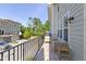 Charming balcony with cozy seating and a view of the neighborhood at 9476 Oakley Dr, Indianapolis, IN 46260