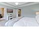 Bright main bedroom with a walk-in closet and ensuite bath at 9476 Oakley Dr, Indianapolis, IN 46260