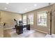 Bright office space with natural light, desk, and neutral decor at 9476 Oakley Dr, Indianapolis, IN 46260