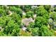 Overhead view of a spacious home featuring a private deck and picturesque outdoor space at 9690 Irishmans Run Ln, Zionsville, IN 46077