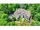 Overhead view of a two-story home with green lawn and a basketball hoop at 9690 Irishmans Run Ln, Zionsville, IN 46077