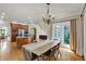 Open-concept dining room with access to kitchen and natural light at 9690 Irishmans Run Ln, Zionsville, IN 46077