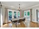 Dining room with access to the outdoor deck at 9690 Irishmans Run Ln, Zionsville, IN 46077