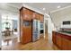Spacious kitchen featuring stainless steel appliances and custom wood cabinetry at 9690 Irishmans Run Ln, Zionsville, IN 46077