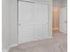 Double door closet in a bedroom or office space at 9806 Olympic Blvd, Pendleton, IN 46064
