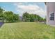 Expansive backyard featuring well-maintained lawn and a patio area perfect for outdoor gatherings at 10107 Landis Blvd, Fishers, IN 46040
