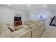 Open basement area with comfortable seating and entertainment options including a TV at 10107 Landis Blvd, Fishers, IN 46040