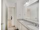 Bright bathroom with double sinks, granite countertops, and a spacious mirror at 10107 Landis Blvd, Fishers, IN 46040