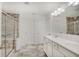 Bright bathroom featuring double vanity, modern fixtures, and a glass-enclosed shower at 10107 Landis Blvd, Fishers, IN 46040