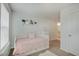 Cozy bedroom with a daybed, decorative shelves, and soft colors for a peaceful retreat at 10107 Landis Blvd, Fishers, IN 46040