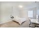 Bright bedroom features a hanging swing chair, plush carpet, and a modern vanity desk with lighted mirror at 10107 Landis Blvd, Fishers, IN 46040