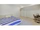 Comfortable bedroom with bright carpet, study desk, and neutral walls and trim at 10107 Landis Blvd, Fishers, IN 46040