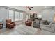 Inviting living room with large windows, plush seating, and an open layout for easy entertaining at 10107 Landis Blvd, Fishers, IN 46040