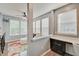 Bright office nook featuring modern gray walls, white trim and a built-in desk with plenty of natural light at 10107 Landis Blvd, Fishers, IN 46040