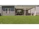 Lush backyard with a spacious covered patio, perfect for outdoor dining and enjoying the serene surroundings at 10725 Crum Ct, Fishers, IN 46037