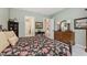 Bedroom with classic decor and view to ensuite bathroom at 10725 Crum Ct, Fishers, IN 46037