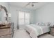 Light-filled bedroom with a comfortable bed, dresser, and a soothing color scheme for a relaxing ambiance at 10725 Crum Ct, Fishers, IN 46037