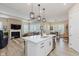 Open-concept kitchen featuring a large island and seating at 10725 Crum Ct, Fishers, IN 46037