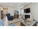 Inviting living room features a fireplace, comfortable seating, and modern decor, perfect for entertaining at 10725 Crum Ct, Fishers, IN 46037