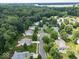 An aerial view of this peaceful neighborhood nestled among mature trees and winding streets offers a serene living environment at 1119 Albemarle Cir, Noblesville, IN 46062