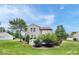 Spacious backyard with a deck, lush green grass, mature trees and landscaping at 1119 Albemarle Cir, Noblesville, IN 46062