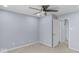 This bedroom features a ceiling fan and neutral carpet, providing a comfortable and inviting space at 1119 Albemarle Cir, Noblesville, IN 46062