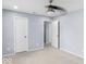 Spacious carpeted bedroom showcasing two doors at 1119 Albemarle Cir, Noblesville, IN 46062