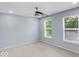 Carpeted bedroom featuring two windows at 1119 Albemarle Cir, Noblesville, IN 46062