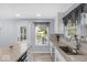 Bright kitchen includes granite countertops and stainless steel appliances at 1119 Albemarle Cir, Noblesville, IN 46062