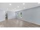 Spacious living room with ample natural light and wood-look flooring at 1119 Albemarle Cir, Noblesville, IN 46062